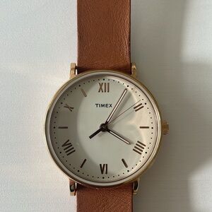 Timex rose gold and leather watch.
